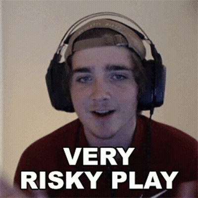 Man With Headphones Saying Very Risky Play GIF