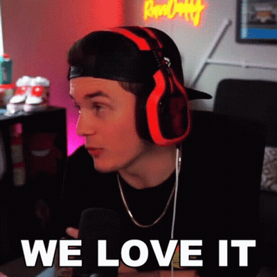 Man With Headphones Saying We Love It Into Microphone