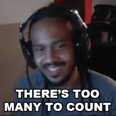 Man With Headphones Says There's Too Many To Count GIF