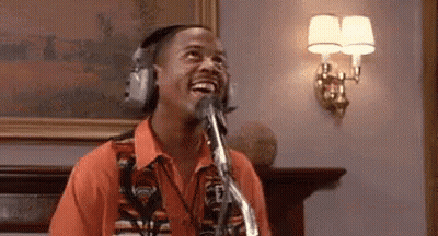 Man With Headphones Singing Into Microphone GIF