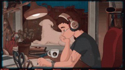 Man With Headphones Sitting At Desk GIF
