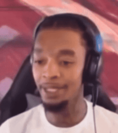 Man With Headphones Sitting In Chair GIF