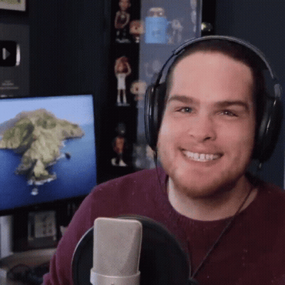 Man With Headphones Smiling At Microphone GIF