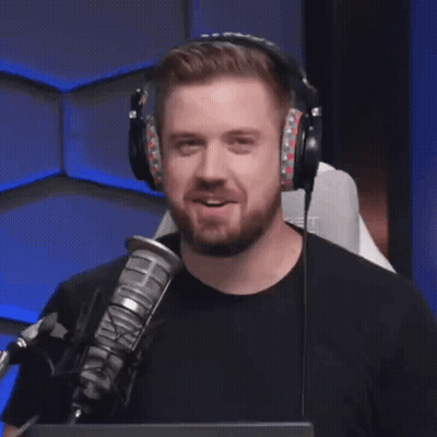 Man With Headphones Smiling At Microphone GIF