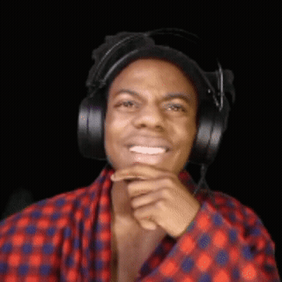 Man With Headphones Smiling Hand To Chin GIF