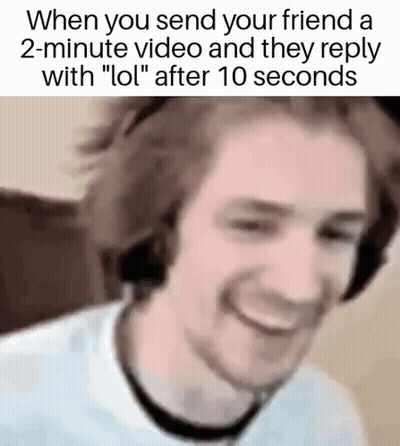Man With Headphones Smiling Watching Video Replies LOL GIF