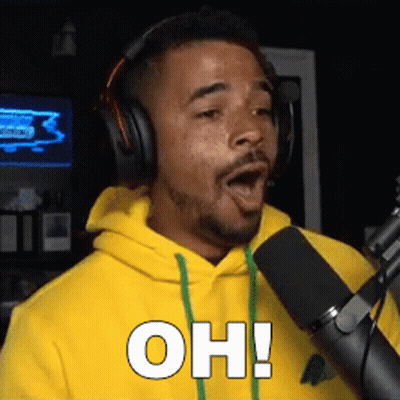 Man With Headphones Talking Into Microphone Saying Oh