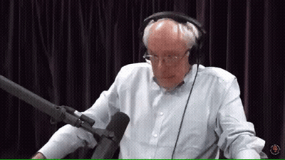 Man With Headphones Talking Into Microphone GIF