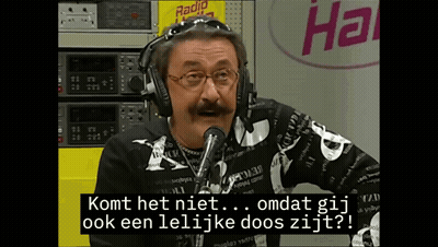 Man With Headphones Talks Into Microphone At Radio Station GIF