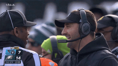 Man With Headphones Talks To Referee Fox NFL Football GIF