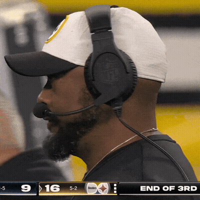 Man With Headphones Watching Steelers Vs Bengals GIF
