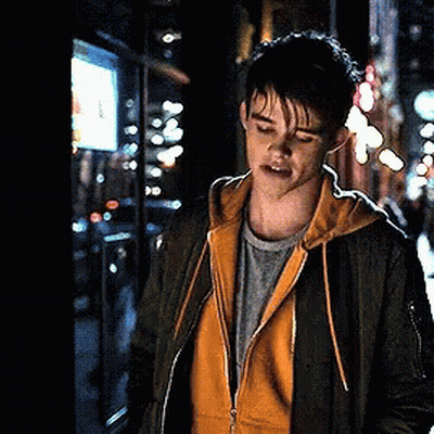 Man With Headphones Wearing Titans Shirt GIF