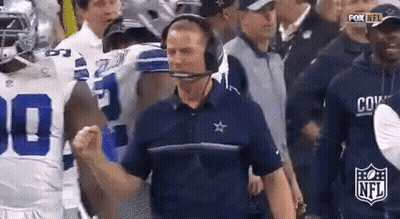 Man With Headset And Football Players GIF