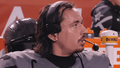 Man With Headset And Microphone In Front Of DeWalt Sign GIF