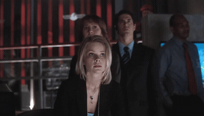 Man With Headset Talking To Group GIF