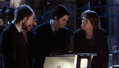 Man With Headset Talking To Group GIF