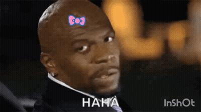 Man With Hello Kitty Bow Saying Haha GIF