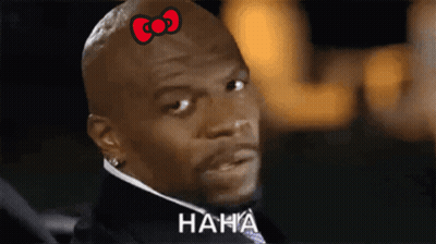 Man With Hello Kitty Bow Saying Haha GIF