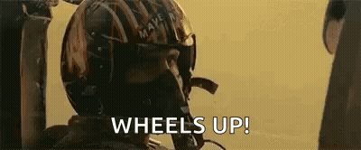 Man With Helmet And Goggles In Desert GIF