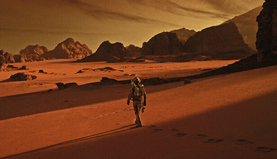Man With Helmet In Desert GIF