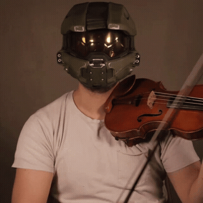 Man With Helmet Playing Violin GIF