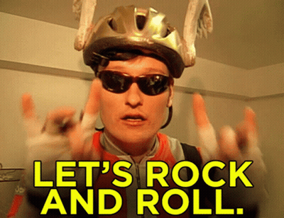 Man With Helmet Sunglasses Bandaged Hand Says Let's Rock And Roll GIF