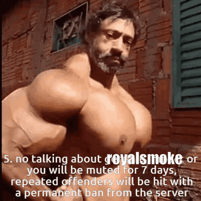 Man With Huge Muscles In Front Of Brick Building GIF