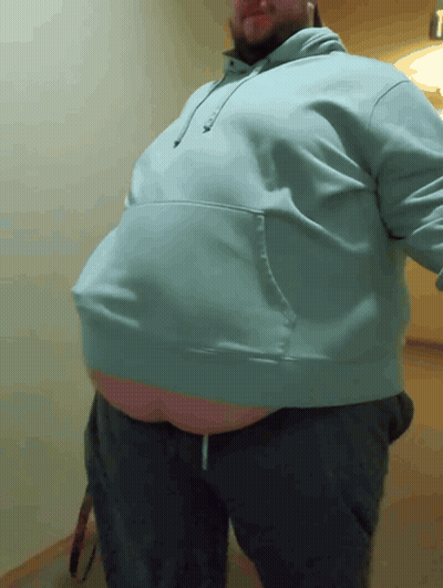 Man With Large Belly In Blue Hoodie GIF