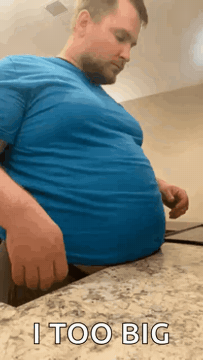 Man With Large Belly Sitting GIF