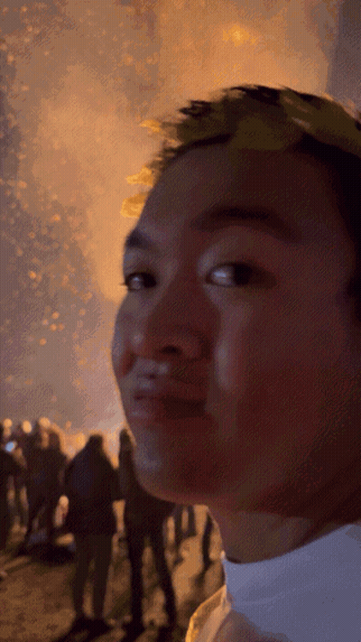 Man With Laurel Wreath In Front Of Crowd GIF