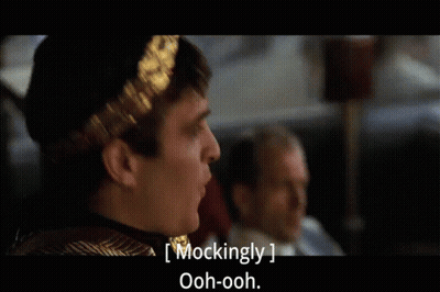 Man With Laurel Wreath Mockingly Saying Ooh Ooh GIF
