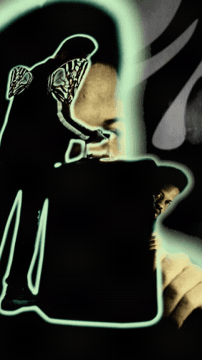 Man With Letter M On Chest GIF
