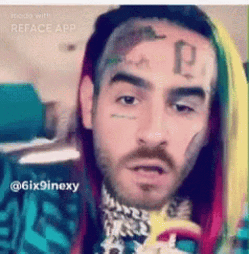 Man With Letter P Tattoo On Face GIF
