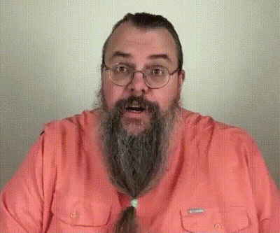 Man With Long Beard And Glasses In Pink Shirt GIF