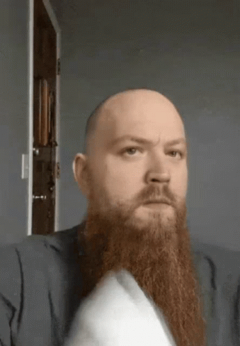 Man With Long Beard Sitting GIF