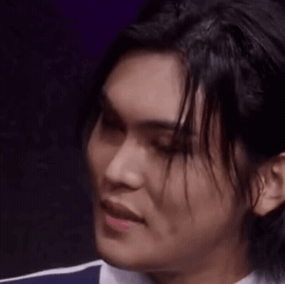Man With Long Black Hair Making Funny Face GIF