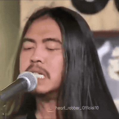 Man With Long Black Hair Singing GIF