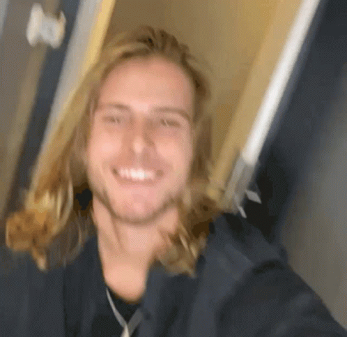 Man With Long Blonde Hair And Beard Smiling GIF