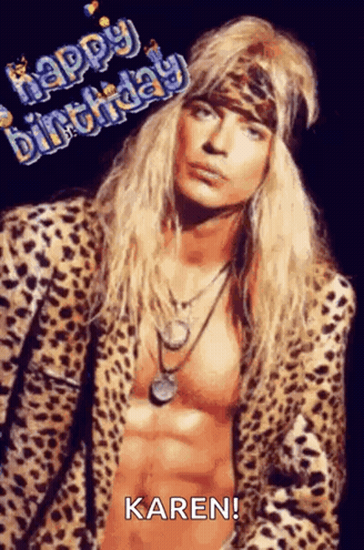 Man With Long Blonde Hair In Leopard Print Jacket And Bandana GIF