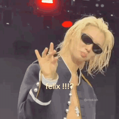 Man With Long Blonde Hair Sunglasses And Jacket GIF