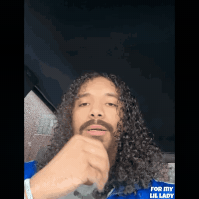 Man With Long Curly Hair And Beard In Blue Jacket Saying For My Lil Lady GIF