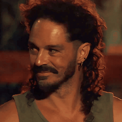 Man With Long Curly Hair And Beard Smiling GIF