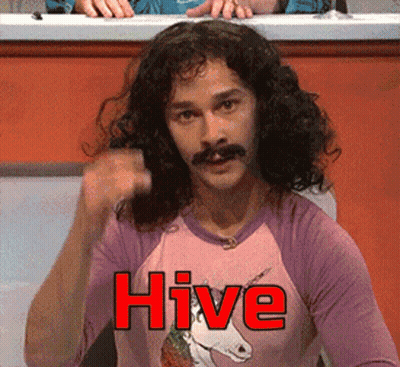 Man With Long Curly Hair And Mustache In Pink Hive Shirt GIF