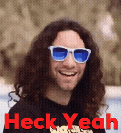 Man With Long Curly Hair And Sunglasses Saying Heck Yeah GIF