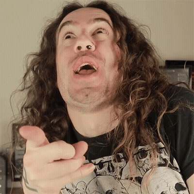 Man With Long Curly Hair Pointing Finger GIF