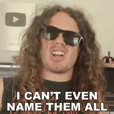 Man With Long Curly Hair Sunglasses Says I Can't Even Name Them All GIF