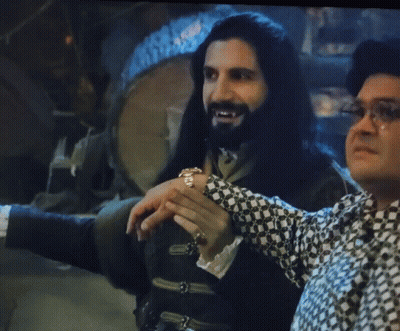 Man With Long Hair And Beard Beside Another Man GIF