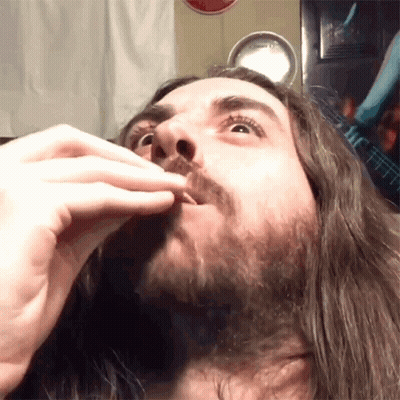 Man With Long Hair And Beard Eating GIF