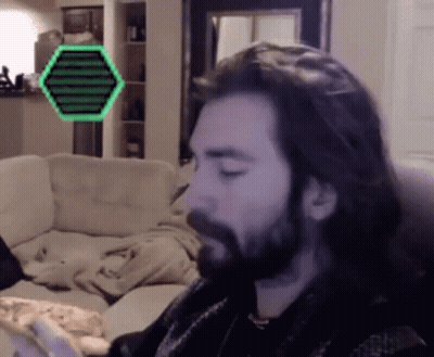 Man With Long Hair And Beard Eating Pizza GIF