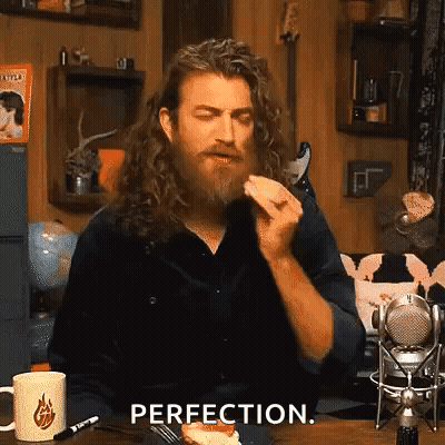 Man With Long Hair And Beard Eating Pizza GIF
